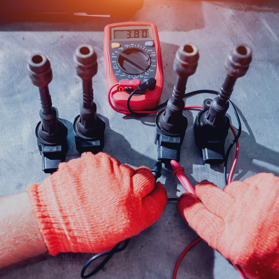 Boat Mechanic Working on Ignition Coils